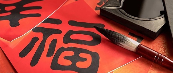 ţ